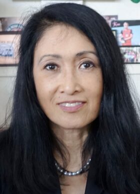 Dr. Rumi Price